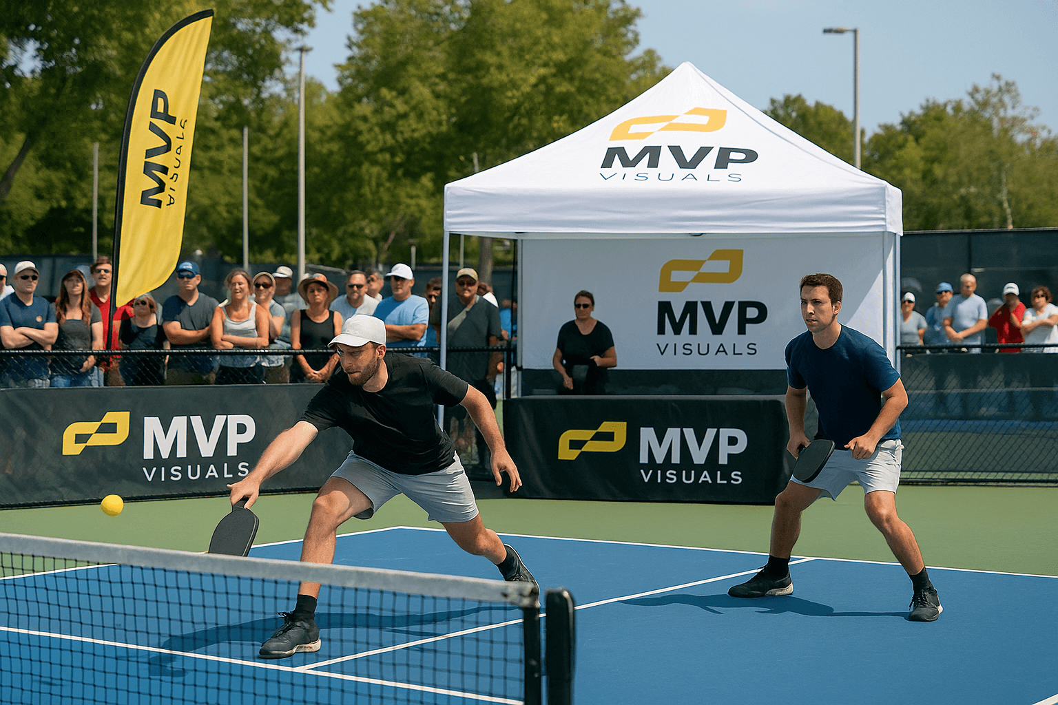 Pickleball players competing in a fun tournament match with MVP Visuals tent and crowd cheering in the background