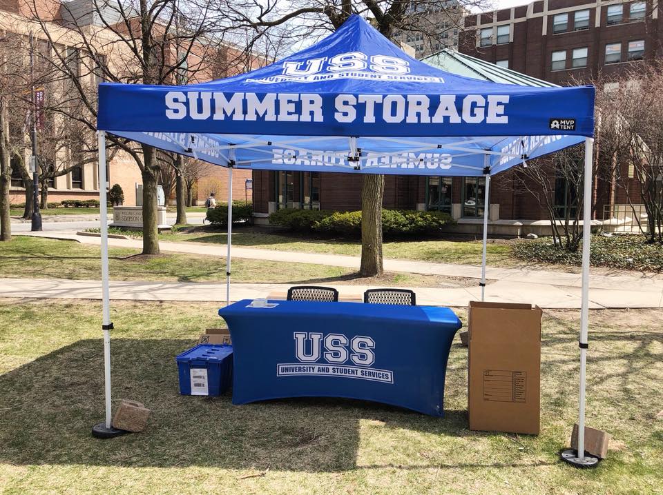 University and Student Services blue canopy for summer storage information