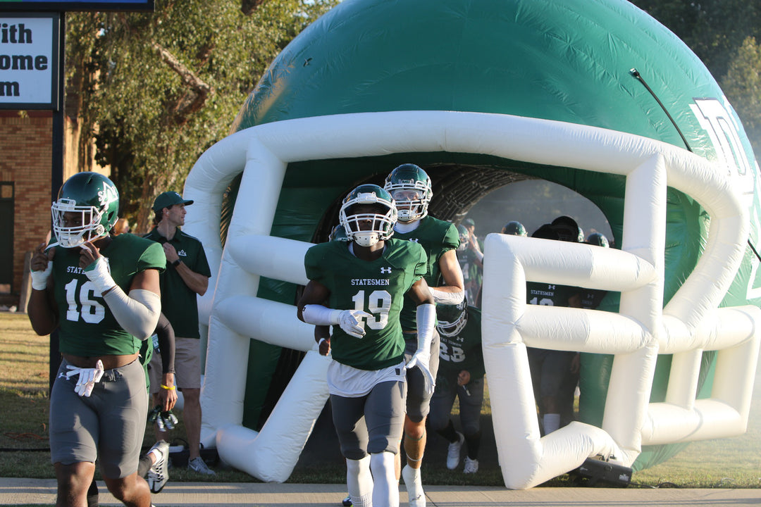 delta state university football entrance helmet with players coming through