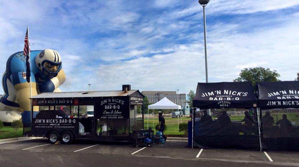 Outdoor seating tents for event catering, providing a spacious and professional setup for guests