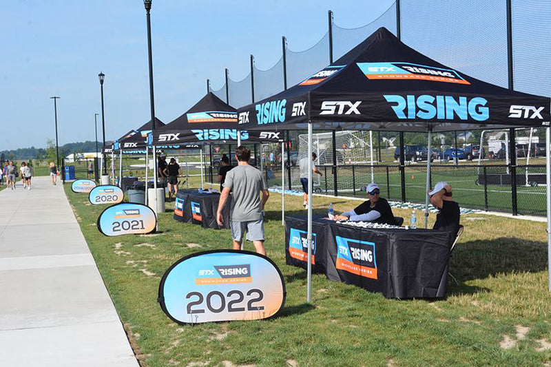 STX Rising event with consecutive year pop out banners and branded tents