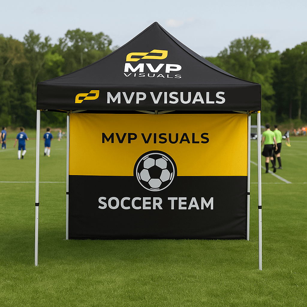 MVP Visuals tent on a soccer field with players in the background