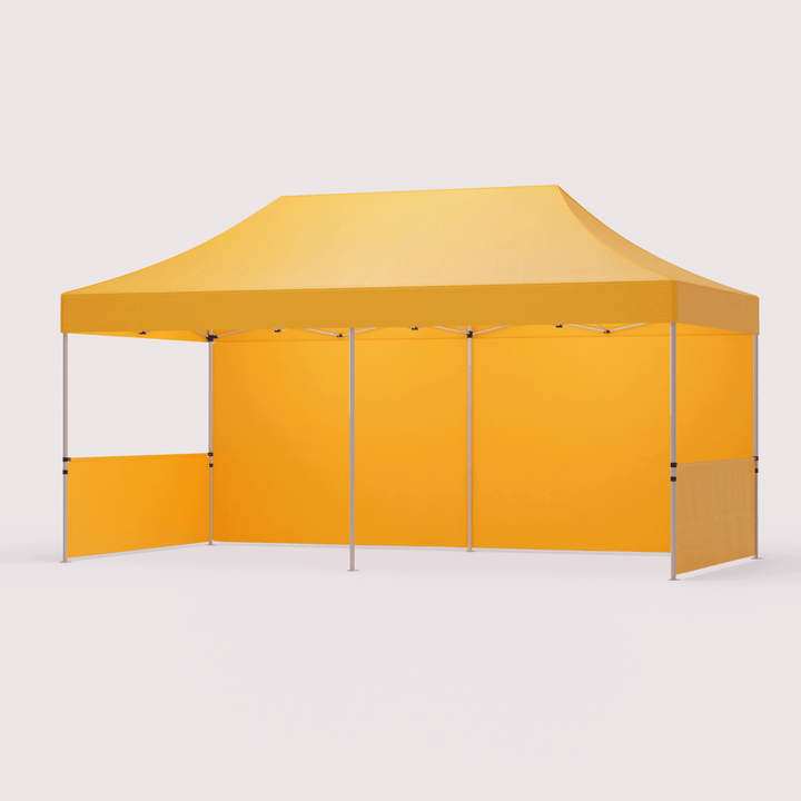 10 x 20 custom canopy with half-walls on both sides and full-height wall in the back