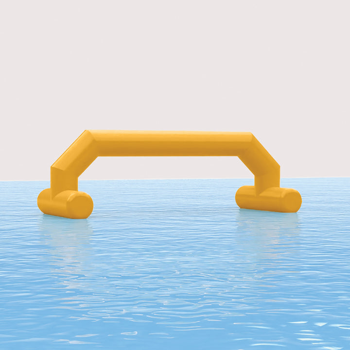 Plain yellow inflatable floating arch set up on calm water for open water events or branding