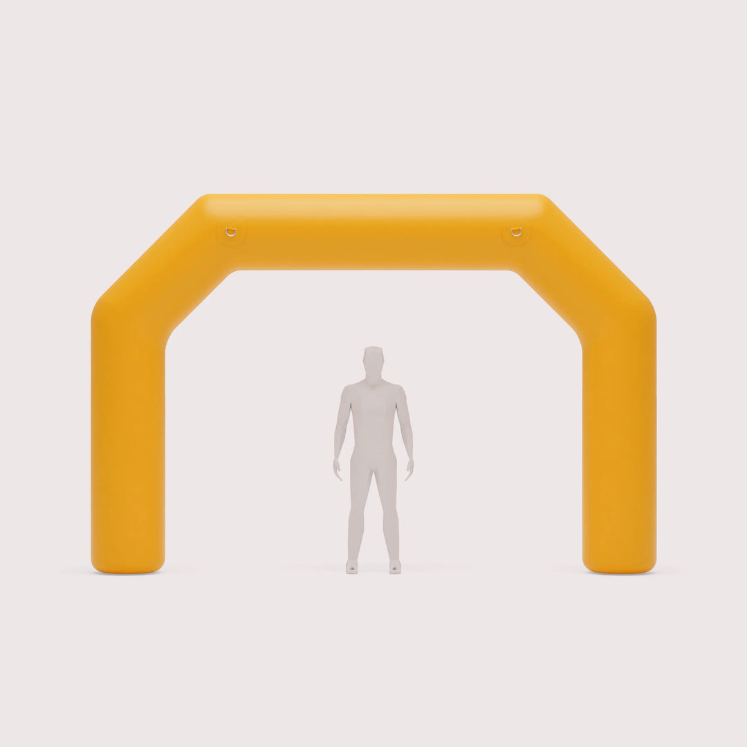 Yellow inflatable arch with a small human figure for scale.