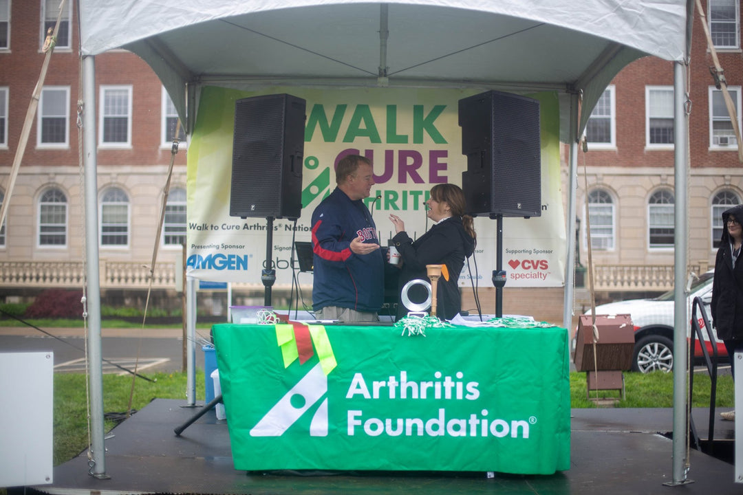 Arthritis Foundation’s nonprofit booth with custom canopy and table covers.