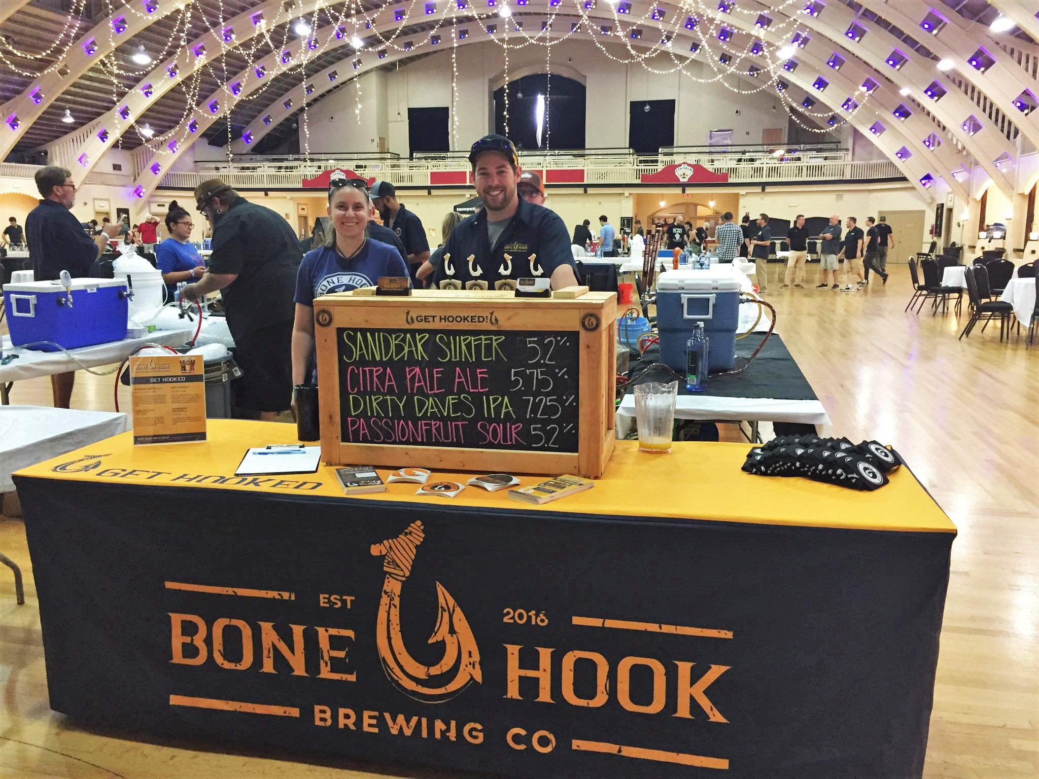 bone hook brewing company's booth with polyester table covered stand is completely wrinkle free