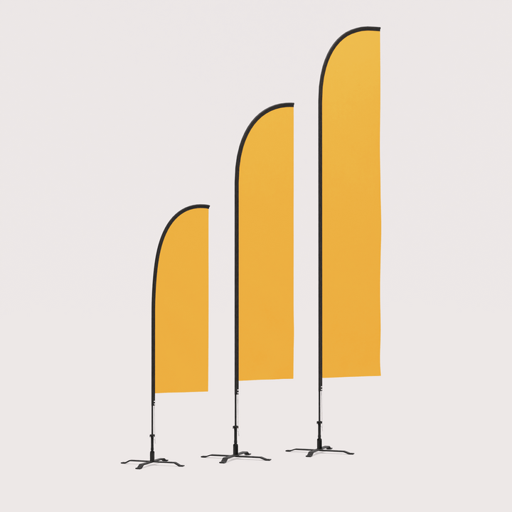 Three differently sized flying feather flags