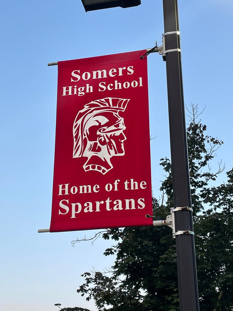 hanging double sided vinyl banner of Somers high school