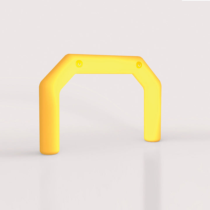 Plain yellow inflatable LED arch with rounded legs, displayed in a white indoor setting.