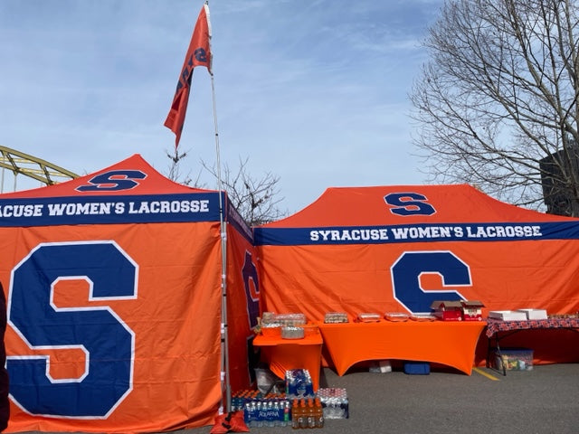 two Syracuse University womens collegiate lacrosse team tents connected next to each other