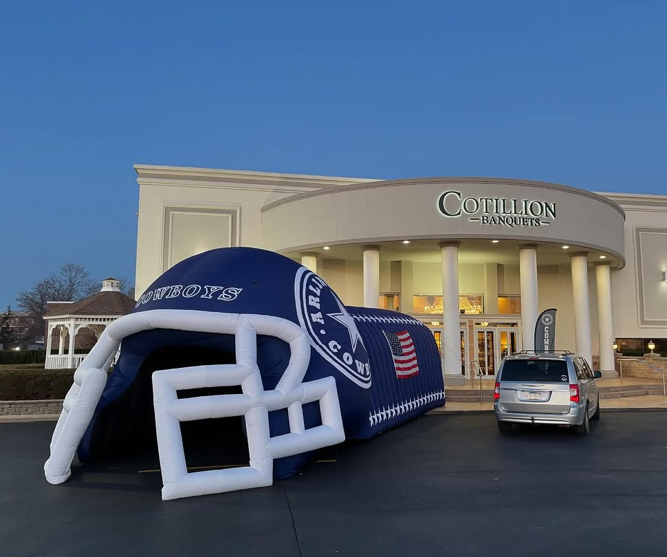 Cowboys inflatable helmet tunnel outside Cotillion Banquets