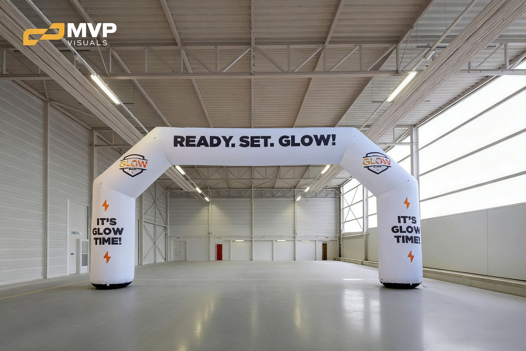 White inflatable arch with “Ready. Set. Glow!” and It’s Glow Time! text