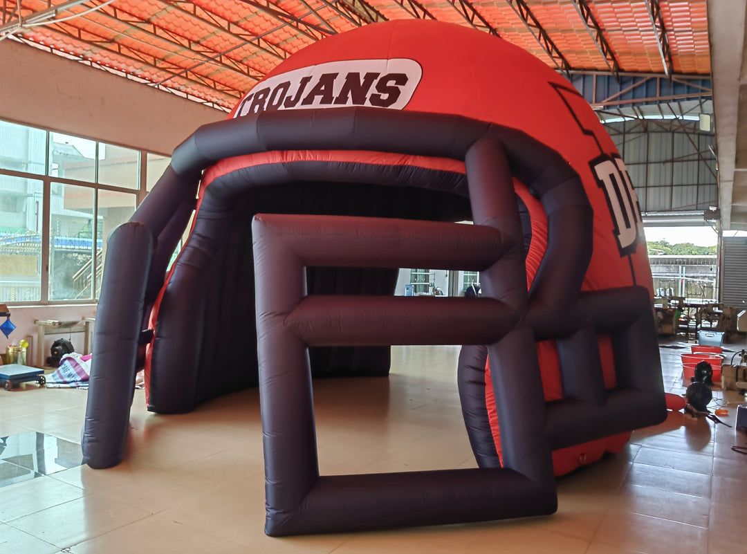 indoor view of inflatable Trojans football helmet tunnel