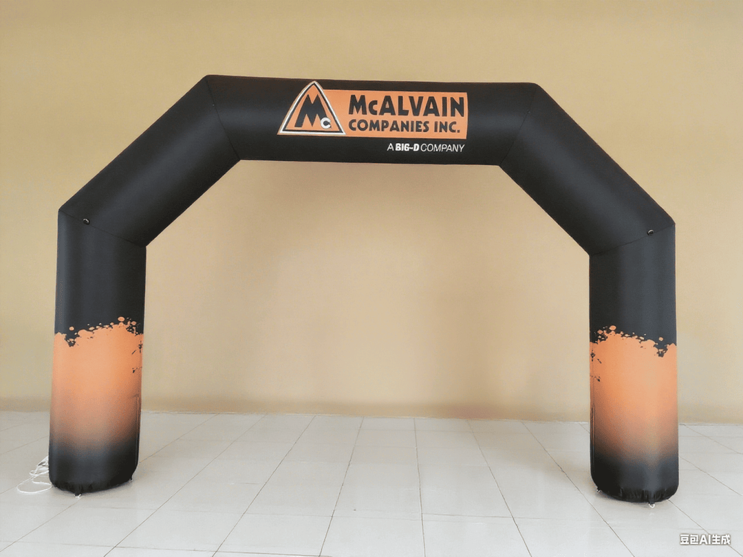 Inflatable arch with McAlvain Companies Inc. logo in black and orange color scheme