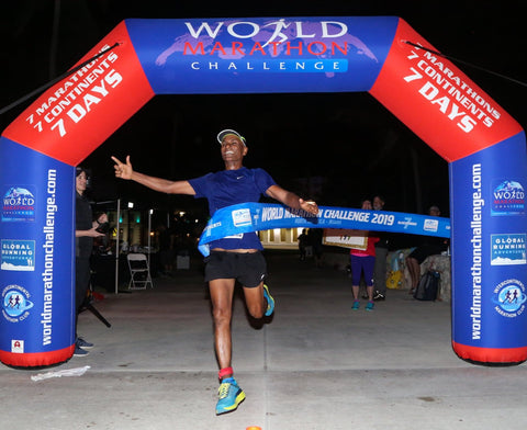 World Marathon Challenge inflatable arch at a global race finish line