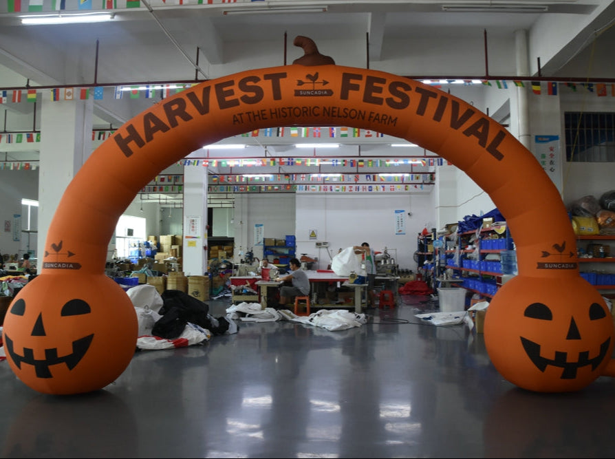 inflatable arch with pumpkin jack-o'-lantern design for Suncadia Harvest Festival
