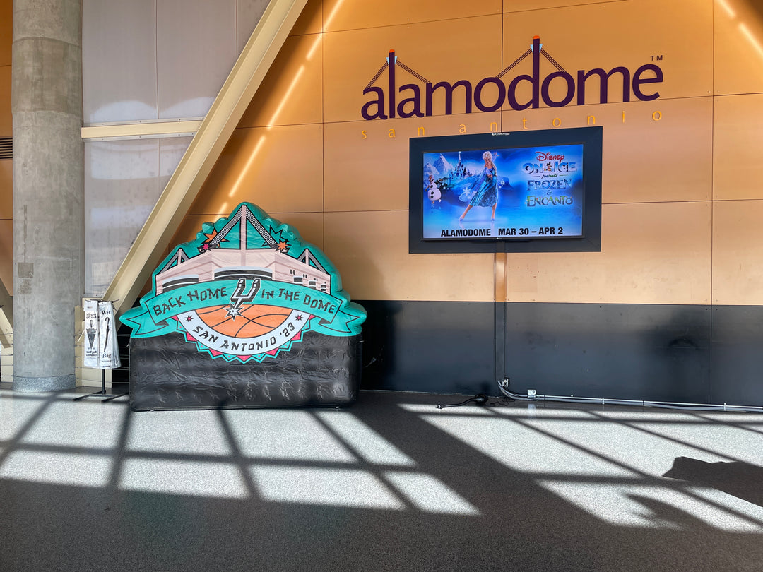 Inflatable San Antonio Spurs float at Alamodome with “Back Home in the Dome” branding