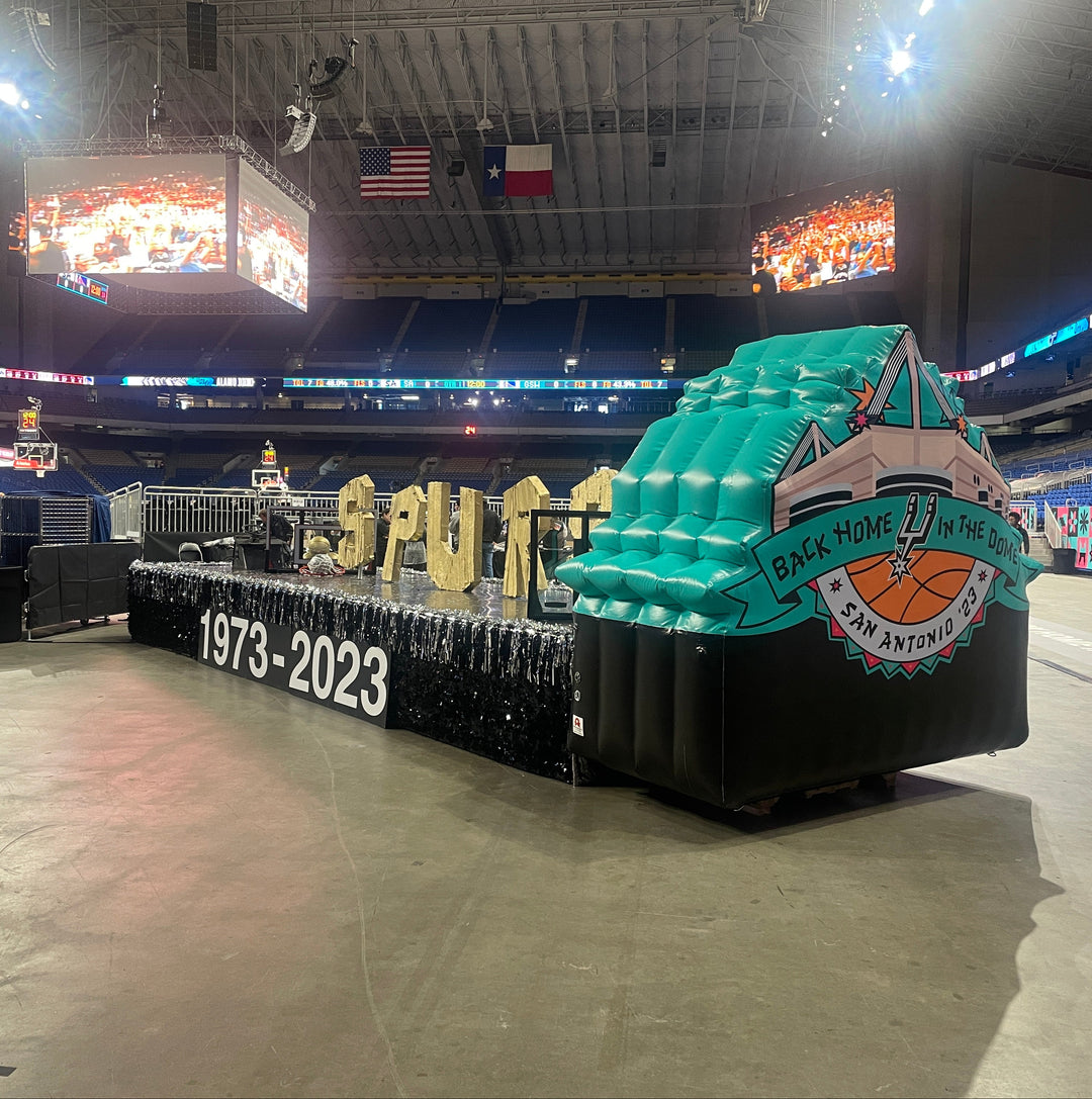 Indoor display of inflatable San Antonio Spurs logo at Alamodome