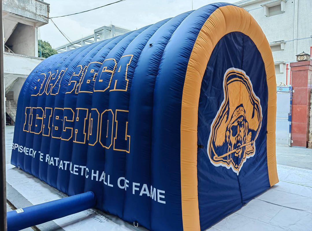 Boca Ciega High School inflatable tunnel with pirate logo and blue-gold color scheme