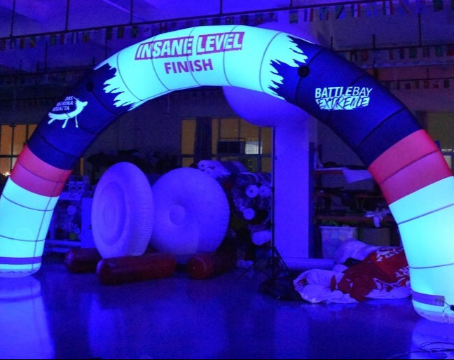 LED inflatable arch with "INSANE LEVEL FINISH" and Battle Bay Extreme branding