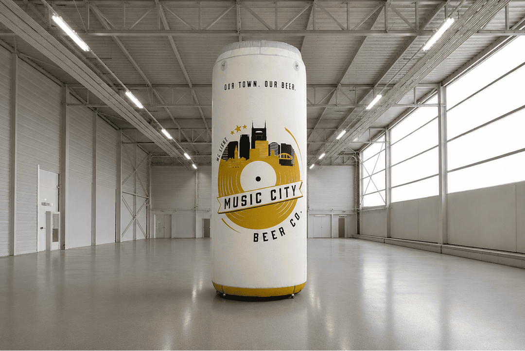 Inflatable can with 'Music City Beer Co.' design in a large indoor space.