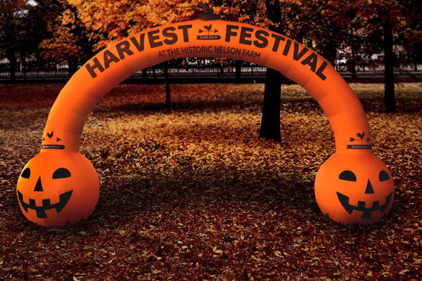 Halloween-themed inflatable arch with pumpkin designs for the Harvest Festival at the historic Nelson Farm