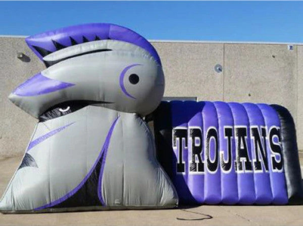 inflatable mascot tunnel customized for trojans high school football team