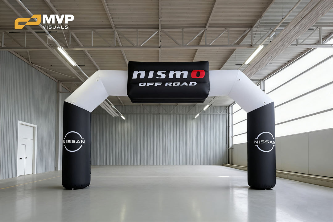Nissan NISMO Off Road inflatable arch with black and white design in indoor facility