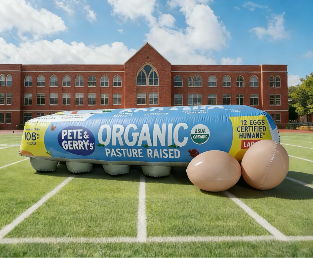 Inflatable egg carton with Pete & Gerry's Organic branding on a sports field.