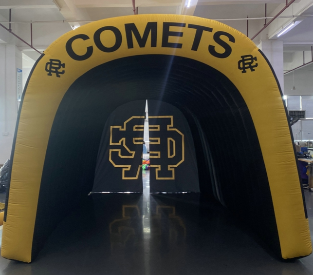 Back view of black and yellow inflatable tunnel with Comets text and RC logo for Reed-Custer school entrances and events