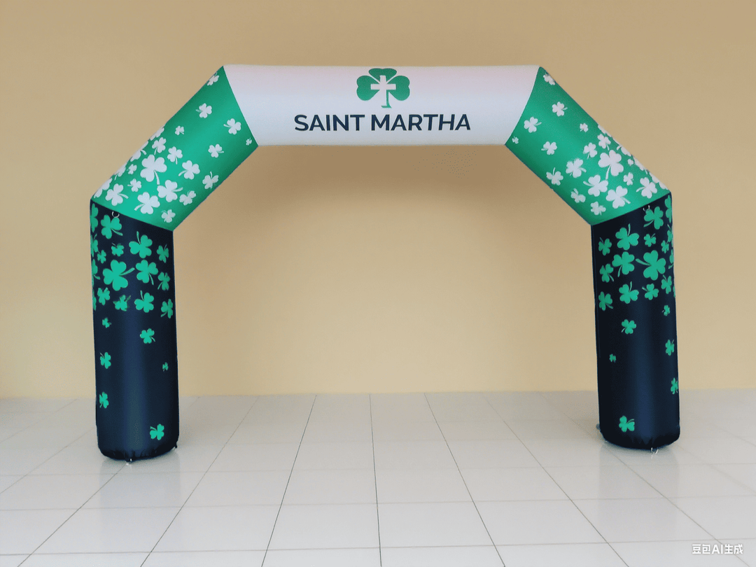 Green and white inflatable arch with shamrock design and 'Saint Martha' text