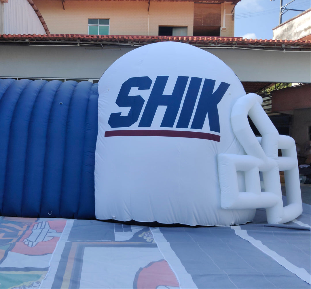 Inflatable helmet tunnel with SHIK logo in white and blue