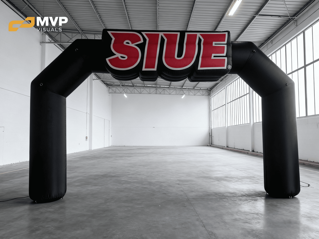 Black inflatable arch with bold SIUE logo in white and red letters