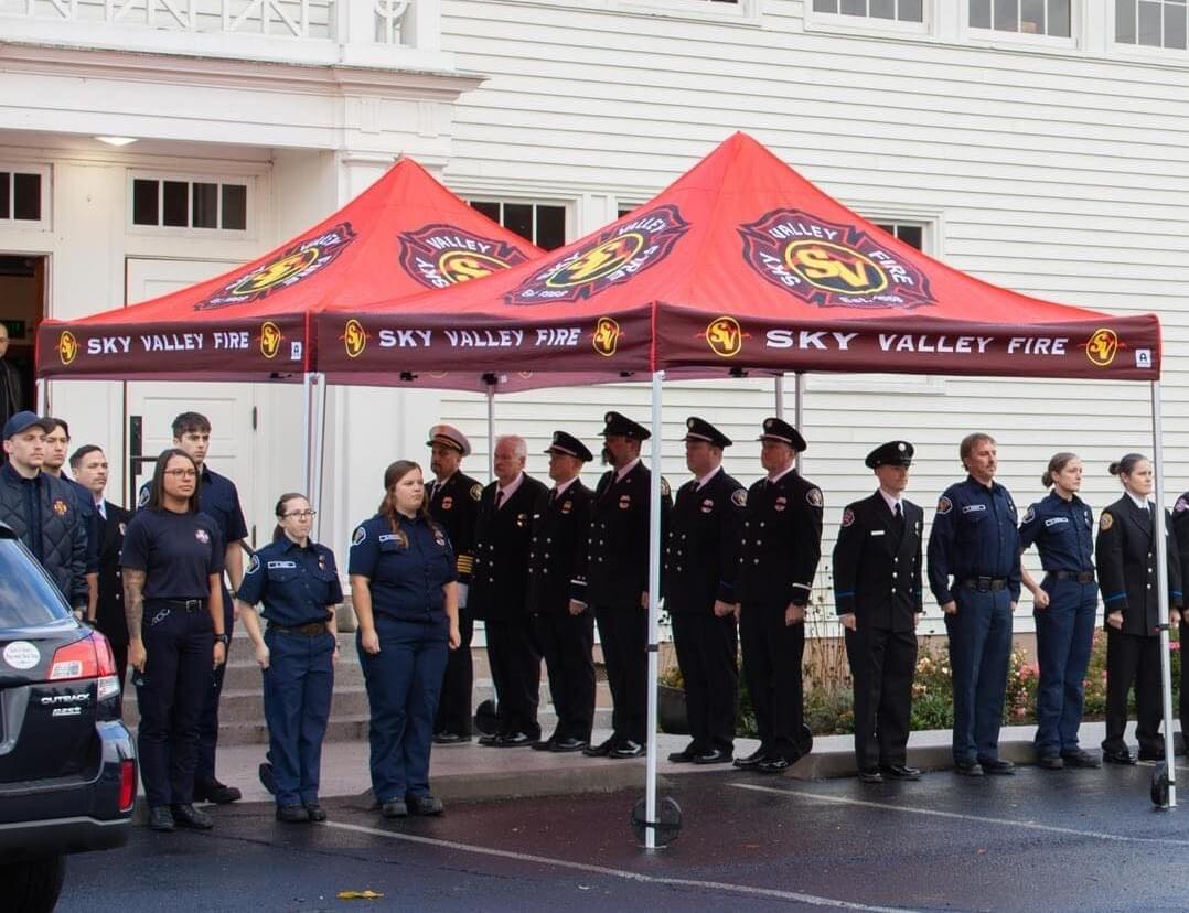 Sky Valley Fire custom canopy tent at formal fire department ceremony with uniformed personnel