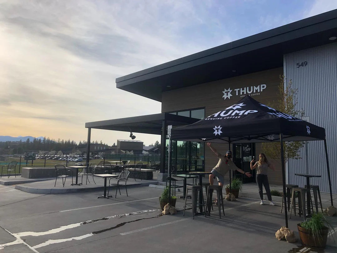 Thump Coffee custom canopy tent setup outside café with branded event tent and outdoor seating area
