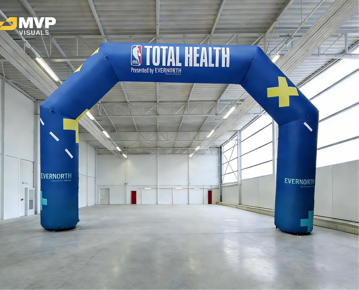 Blue Total Health inflatable promotional arch presented by Evernorth for corporate wellness event or marathon start and finish line branding