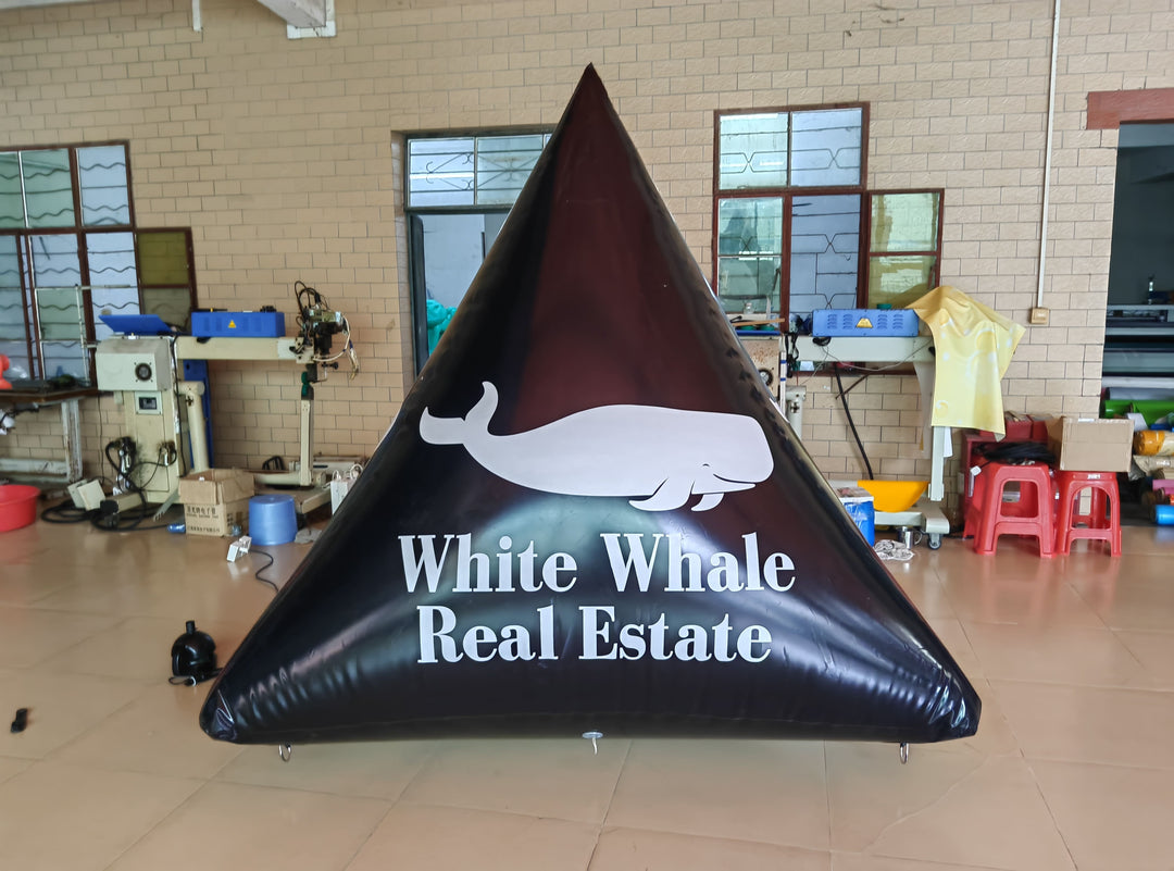 black pyramid inflatable for White Whale Real Estate with white whale logo