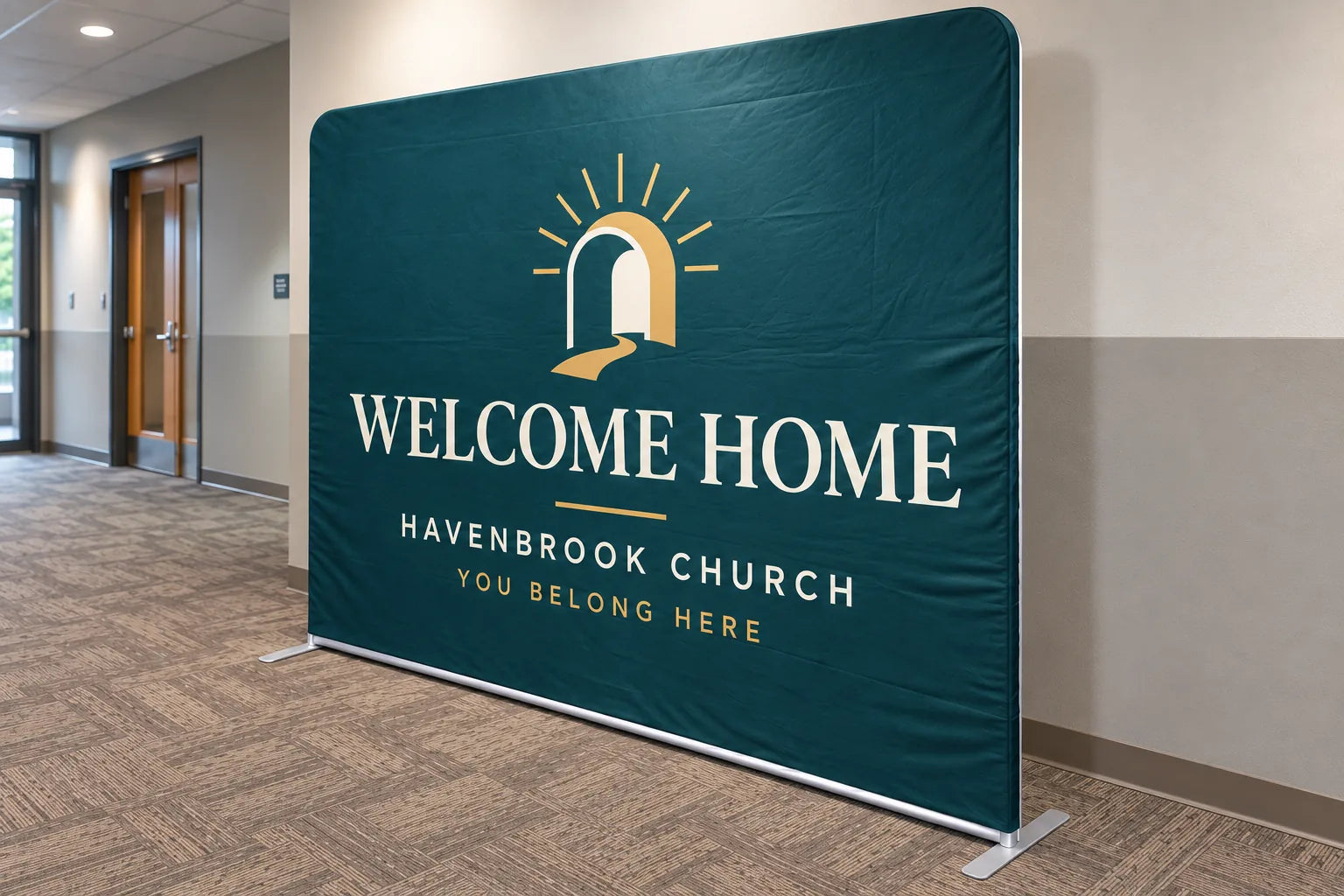 Teal welcome backdrop displayed in a church lobby
